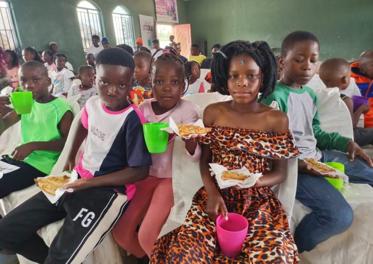 Zambia Children Eating Pizza