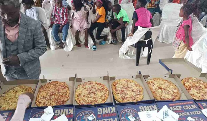 Zambia Children Waiting For Pizza